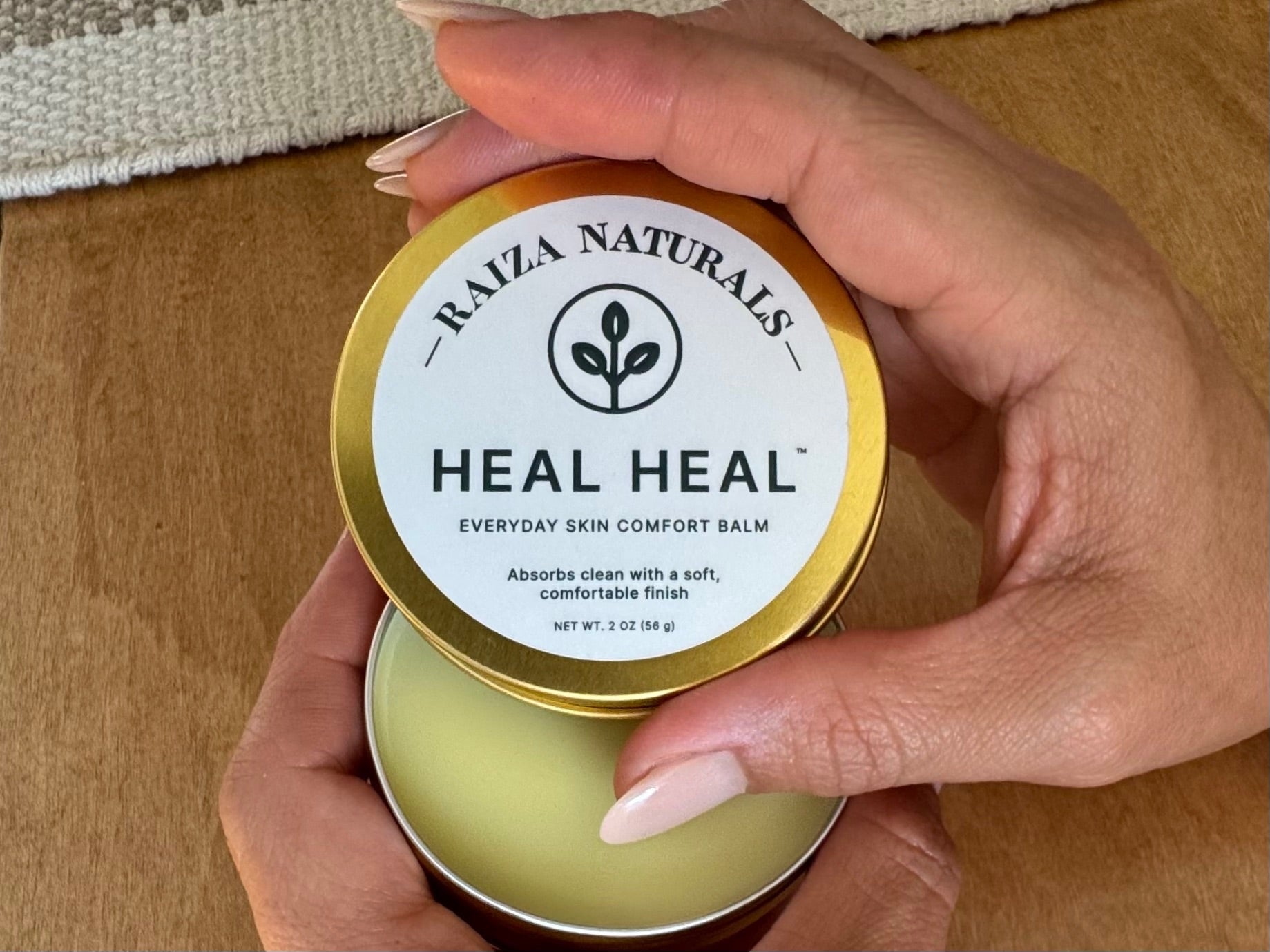 Using Heal Heal everyday skin comfort balm for dry hands, showing smooth application and clean absorption with a soft, natural finish