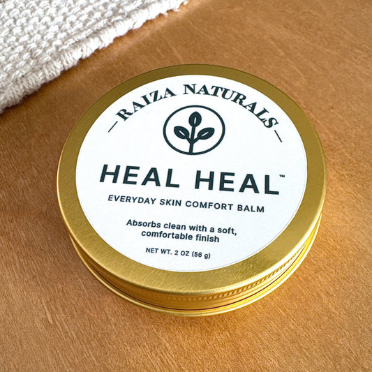 Heal Heal everyday skin comfort balm in gold tin, absorbs clean with a soft, comfortable finish
